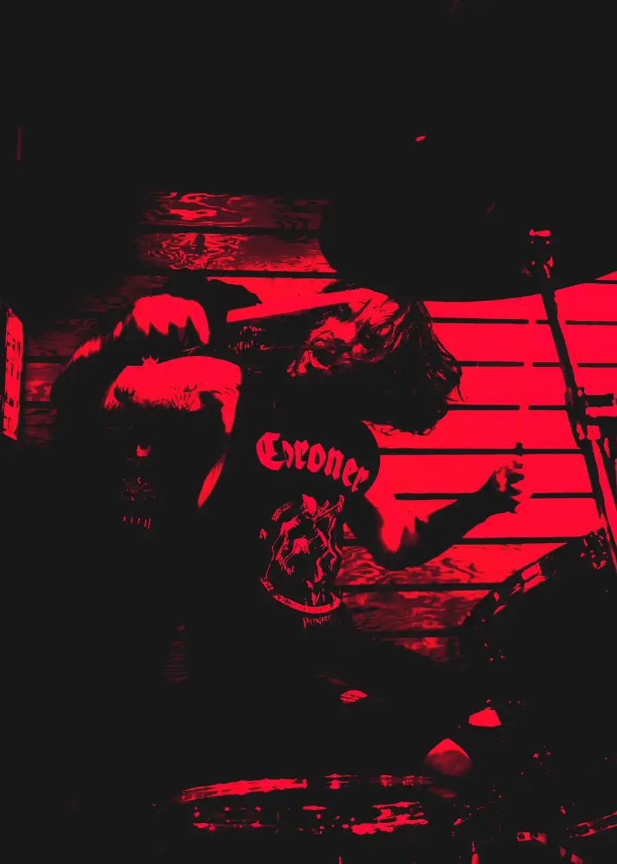 T performing live for Worship Pain